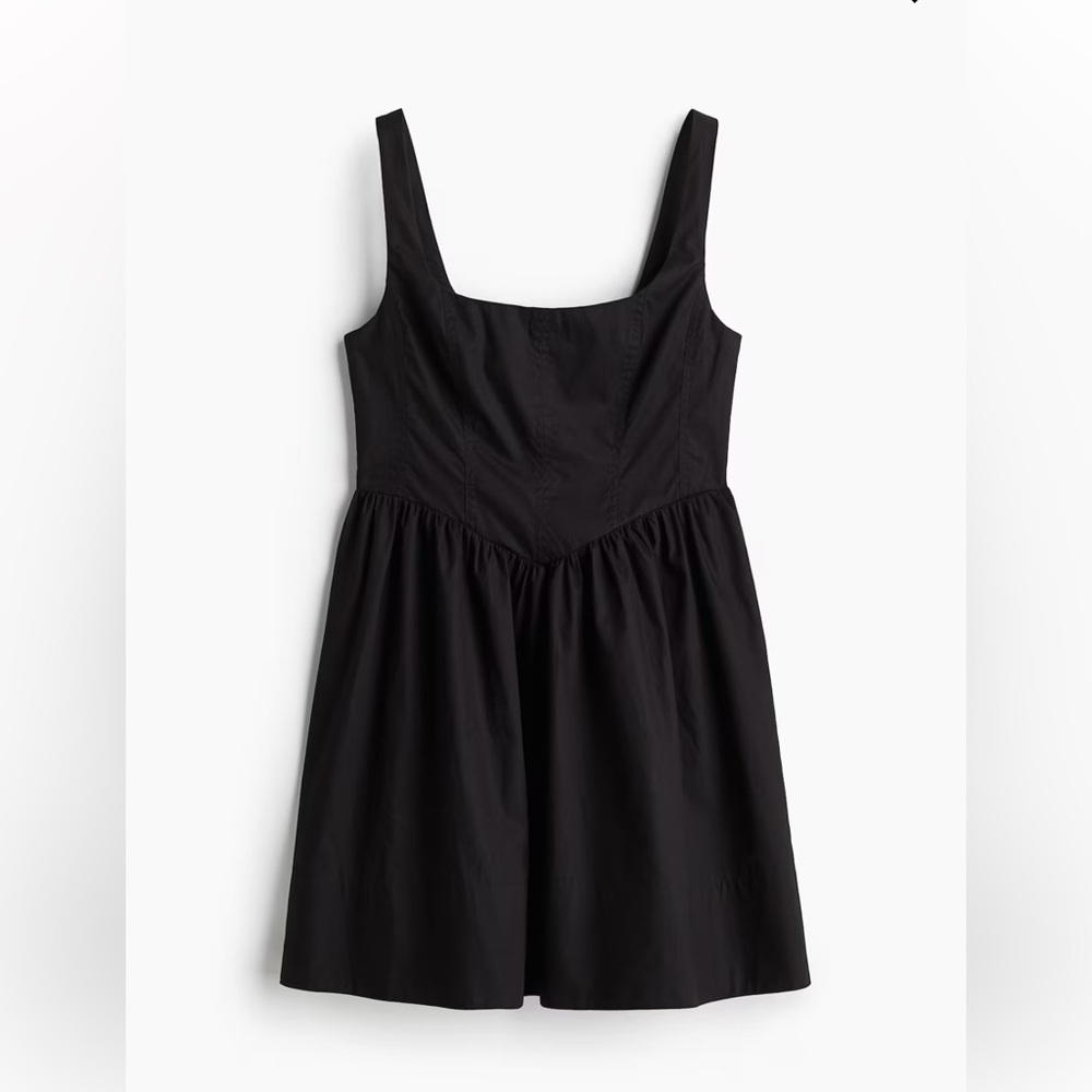 Black mini dress with corset top and flared skirt